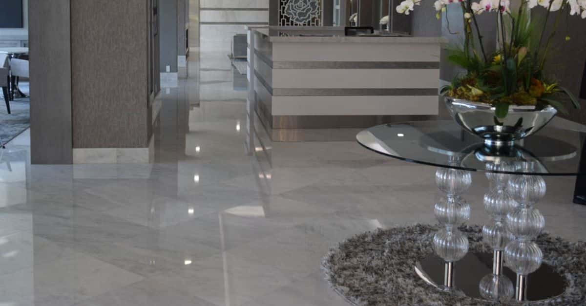 Polished marble flooring in a commercial lobby after professional floor sanding and polishing service